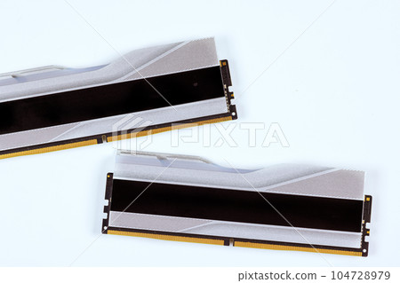 Desktop computer 288-Pin SDRAM DDR5 memory modules on white background 104728979
