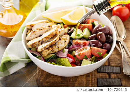 Grilled chicken and fresh vegetables chopped salad Grilled chicken and fresh vegetables chopped salad 104729643