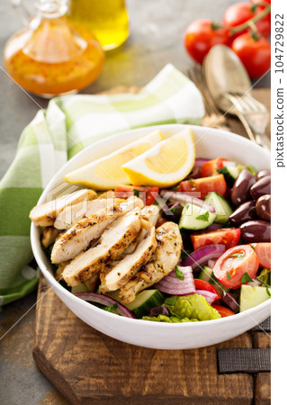 Grilled chicken and fresh vegetables chopped salad Grilled chicken and fresh vegetables chopped salad 104729822