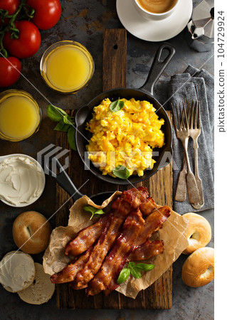 Big breakfast with bacon and scrambled eggs Big breakfast with bacon and scrambled eggs 104729924