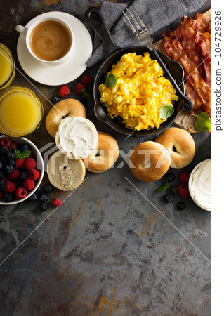 Big breakfast with bacon and scrambled eggs 104729926