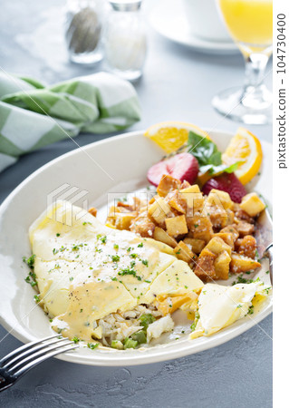 Crab omelette with potatoes for breakfast Crab omelette with potatoes for breakfast 104730400
