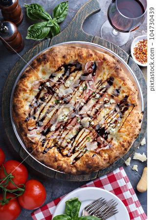 Prosciutto, blue cheese and balsamic vinegar pizza Prosciutto, blue cheese and balsamic vinegar pizza 104730439