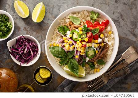 Dinner bowl with rice and pulled pork Dinner bowl with rice and pulled pork 104730565