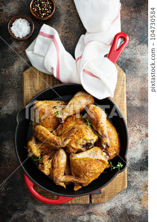 Grilled chicken in a pan 104730584