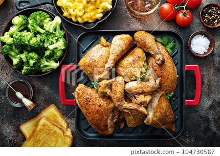 Summer dinner with grilled chicken 104730587