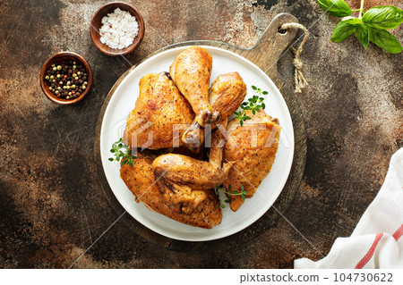 Grilled or smoked chicken Grilled or smoked chicken 104730622