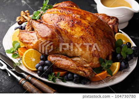 Festive celebration roasted turkey for Thanksgiving Festive celebration roasted turkey for Thanksgiving 104730780