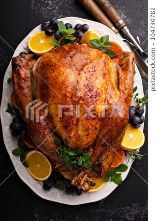 Festive celebration roasted turkey for Thanksgiving 104730782