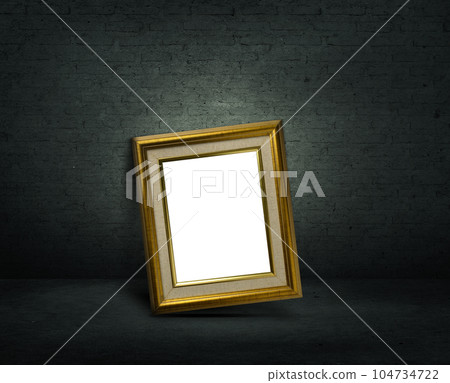 Golden picture frame on room dark wall Golden picture frame on room dark wall 104734722