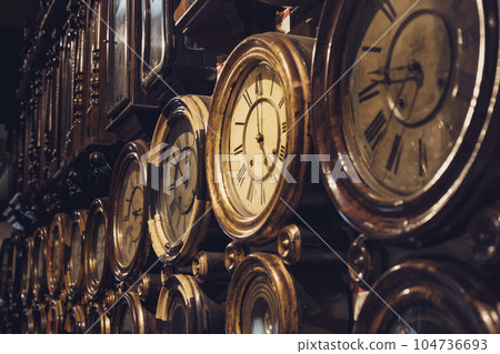 many old wall clocks 104736693