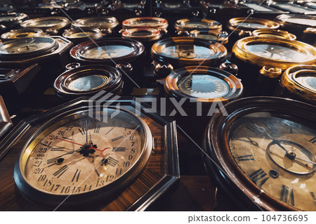 many old wall clocks 104736695