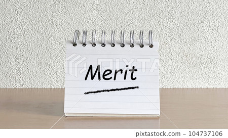 Notepad on the table_front_with Merit letters Notepad on the table_front_with Merit letters 104737106