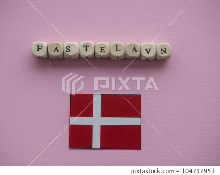 Background with text Fastelavn on wooden cubes 104737951