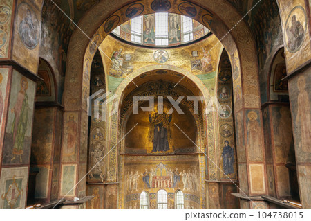 Ukraine, Kyiv - 05 25 2023: St. Sophia church interior. Golden mosaic of Virgin Mary. Ancient christian cathedral. Saint Sophia fresco. Ukrainian religious architecture. Medieval altar decoration. Ukraine, Kyiv - 05 25 2023: St. Sophia church interior. Golden mosaic of Virgin Mary. Ancient christian cathedral. Saint Sophia fresco. Ukrainian religious architecture. Medieval altar decoration. 104738015