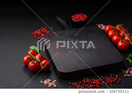 Ingredients for cooking cherry tomatoes, salt, spices and herbs 104739111