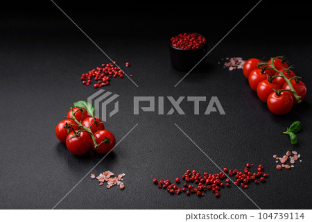 Ingredients for cooking cherry tomatoes, salt, spices and herbs Ingredients for cooking cherry tomatoes, salt, spices and herbs 104739114