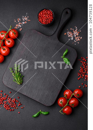 Ingredients for cooking cherry tomatoes, salt, spices and herbs Ingredients for cooking cherry tomatoes, salt, spices and herbs 104739128
