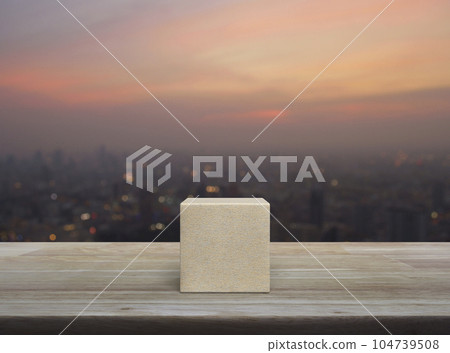 Wood block cube on wooden table Wood block cube on wooden table 104739508