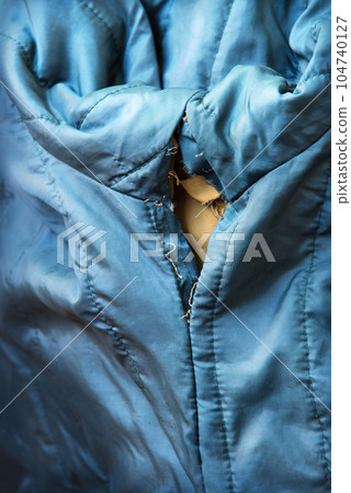 Bolognese jacket torn at the seam Bolognese jacket torn at the seam 104740127