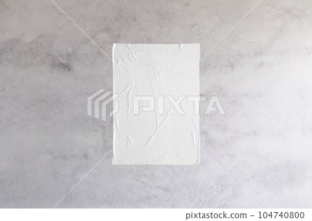 Blank white wheatpaste glued paper poster mockup on concrete wall background Blank white wheatpaste glued paper poster mockup on concrete wall background 104740800