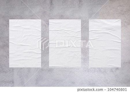 Blank white wheatpaste glued paper poster mockup on concrete wall background Blank white wheatpaste glued paper poster mockup on concrete wall background 104740801