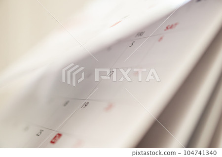 Abstract blur calendar page flipping sheet close up background business schedule planning appointment meeting concept 104741340