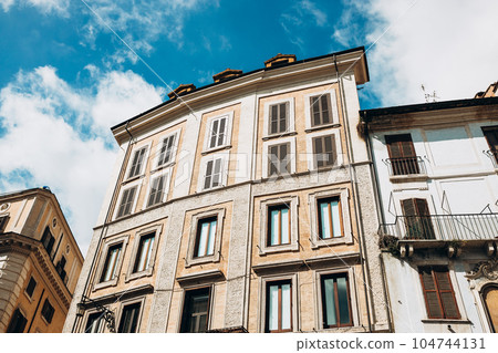 Architecture of Rome. A building with the characteristic facade and windows. Summer time 104744131