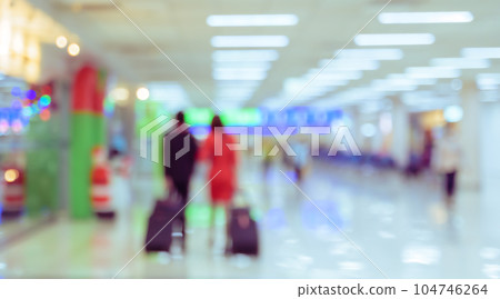 Abstract blurred background of passengers walking at airport boarding area Abstract blurred background of passengers walking at airport boarding area 104746264
