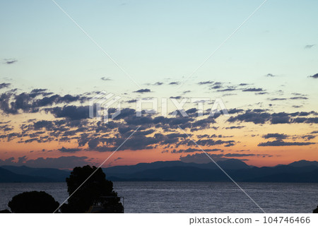 Stunning mountain silhouettes of the Balkan Peninsula during sunrise. Changes in the shade of mountains depending on the distance. Stunning mountain silhouettes of the Balkan Peninsula during sunrise. Changes in the shade of mountains depending on the distance. 104746466