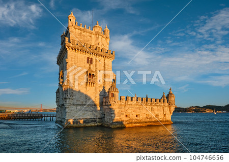 Belem Tower or Tower of St Vincent - famous tourist landmark of Lisboa and tourism attraction - on the bank of the Tagus River Tejo on sunset. Lisbon, Portugal Belem Tower or Tower of St Vincent - famous tourist landmark of Lisboa and tourism attraction - on the bank of the Tagus River Tejo on sunset. Lisbon, Portugal 104746656