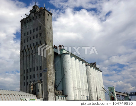 Kiev, Ukraine May 15, 2021: Grain Storage Building Construction Elevator in Kiev Kiev, Ukraine May 15, 2021: Grain Storage Building Construction Elevator in Kiev 104749850