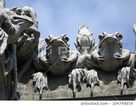 Kiev, Ukraine June 10, 2021: The facade of the building "House with Chimeras" its architectural decoration with sculptures and sculptures of animals and demons 104749859