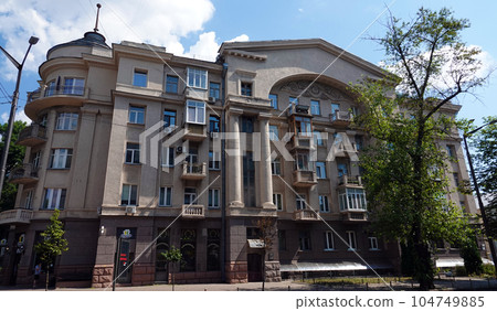Kiev, Ukraine July 11, 2021: Facade of the entrance to the old building of the library decorated with architectural elements of decor with columns in Kiev on Hrushevsky street 9 Kiev, Ukraine July 11, 2021: Facade of the entrance to the old building of the library decorated with architectural elements of decor with columns in Kiev on Hrushevsky street 9 104749885