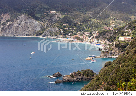 Aerial view of Monterosso from trekking trail, one of the five villages along Cinque Terre hiking strech. Popular tourist destination in Italy 104749942
