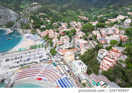 Aerial view of Monterosso, one of the five villages along Cinque Terre hiking strech. Popular tourist destination in Italy 104749947