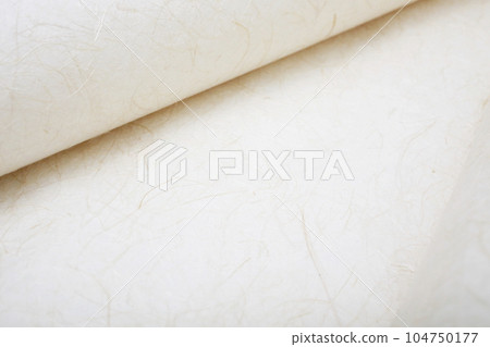 Japanese paper with light beige fibers visible 104750177
