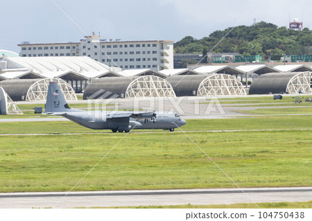 Kadena Air Base runway and US aircraft Kadena Air Base runway and US aircraft 104750438