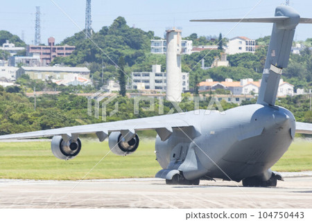 Kadena Air Base runway and US aircraft Kadena Air Base runway and US aircraft 104750443