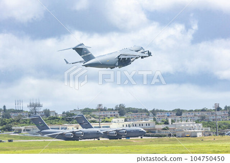 Kadena Air Base runway and US aircraft 104750450