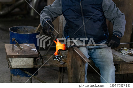 Murano glass blower Murano glass blower 104750718