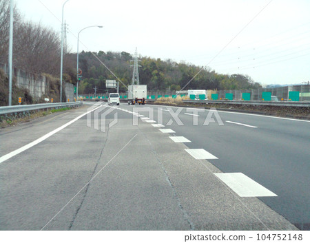 Merging lane at parking area exit 104752148