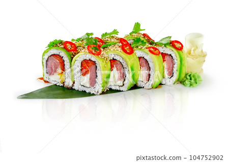 Sushi rolls with salmon, tuna, cream cheese, avocado, spicy chili pepper and cilantro 104752902