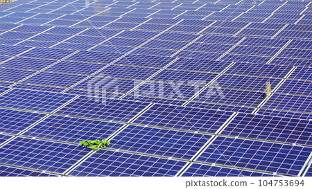 Landscape with solar panels (solar panels installed in a vacant lot) Landscape with solar panels (solar panels installed in a vacant lot) 104753694