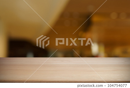 Empty wood table top and blur of out door garden background Empty wooden table space for text marketing promotion. blank wood table copy space for background Empty wood table top and blur of out door garden background Empty wooden table space for text marketing promotion. blank wood table copy space for background 104754077