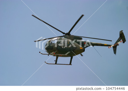 Small Helicopter OH-6D of the Ground Self-Defense Force in flight 104754446