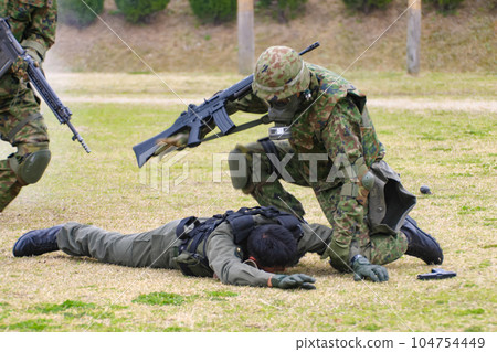 Ground Self-Defense Force personnel conducting a training exhibition 104754449