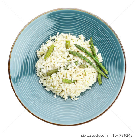 Delicious risotto with asparagus isolated on white, top view Delicious risotto with asparagus isolated on white, top view 104756243