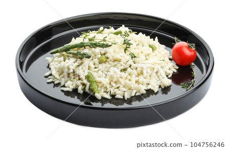 Delicious risotto with asparagus isolated on white Delicious risotto with asparagus isolated on white 104756246