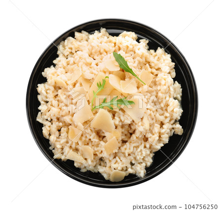 Delicious risotto with cheese isolated on white, top view 104756250